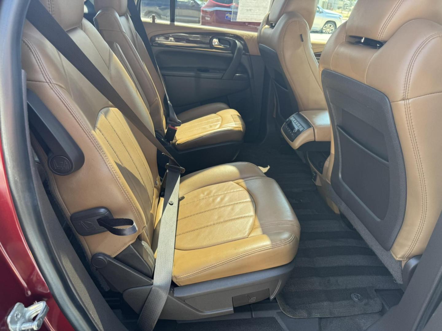 2015 Maroon /BEIGE Buick Enclave Premium AWD (5GAKVCKD9FJ) with an 3.6L V6 DOHC 24V engine, 6-Speed Automatic Overdrive transmission, located at 116 5th Avenue South, Lewistown, MT, 59457, 47.063877, -109.427879 - Looking for a 3rd row SUV that rides like a luxury sedan? This 2015 Buick Enclave Premium AWD delivers quiet comfort, smooth power, and plenty of space for the whole family. Premium trim means it’s loaded with features—heated and cooled leather seats, Bose audio, power liftgate, remote start, an - Photo#8