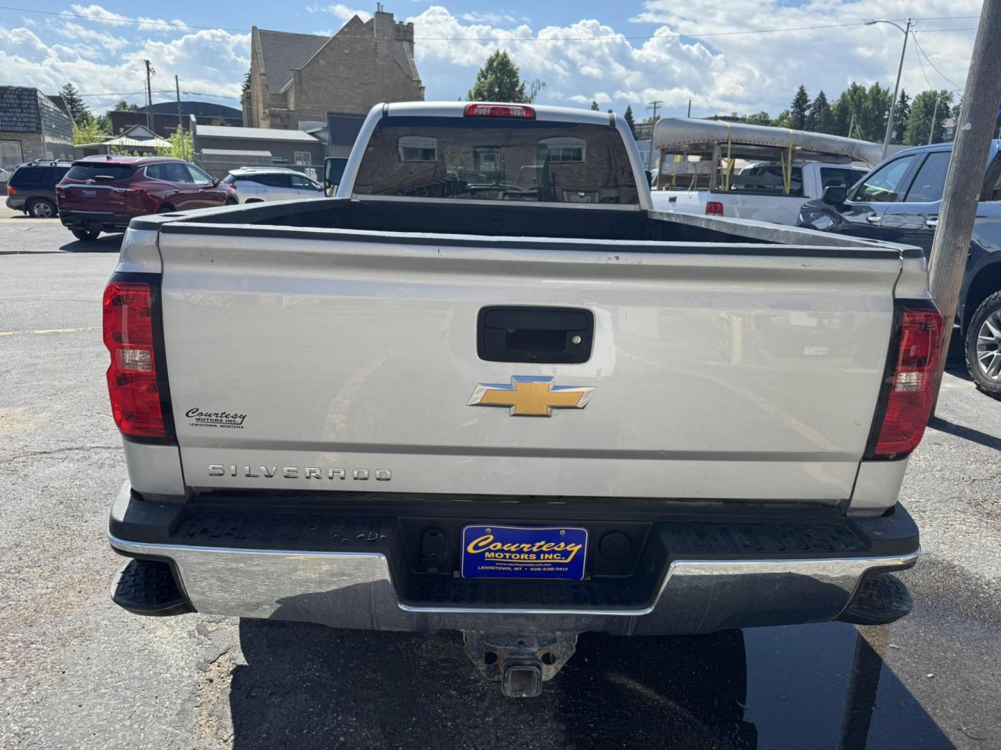 2018 Silver /Grey Chevrolet Silverado 3500HD Work Truck Double Cab Long Box 4WD (1GC2KYEG4JZ) with an 6.0L V8 OHV 16V FFV engine, 6A transmission, located at 116 5th Avenue South, Lewistown, MT, 59457, 47.063877, -109.427879 - If you need serious muscle, this 2018 Chevy Silverado 3500 HD 4x4 Work Truck is built to get the job done. Powered by a proven 6.0L V8 and paired with a heavy-duty 6-speed automatic, this long box double cab hauls, tows, and handles business without breaking a sweat. 4WD gives you confident tractio - Photo#3