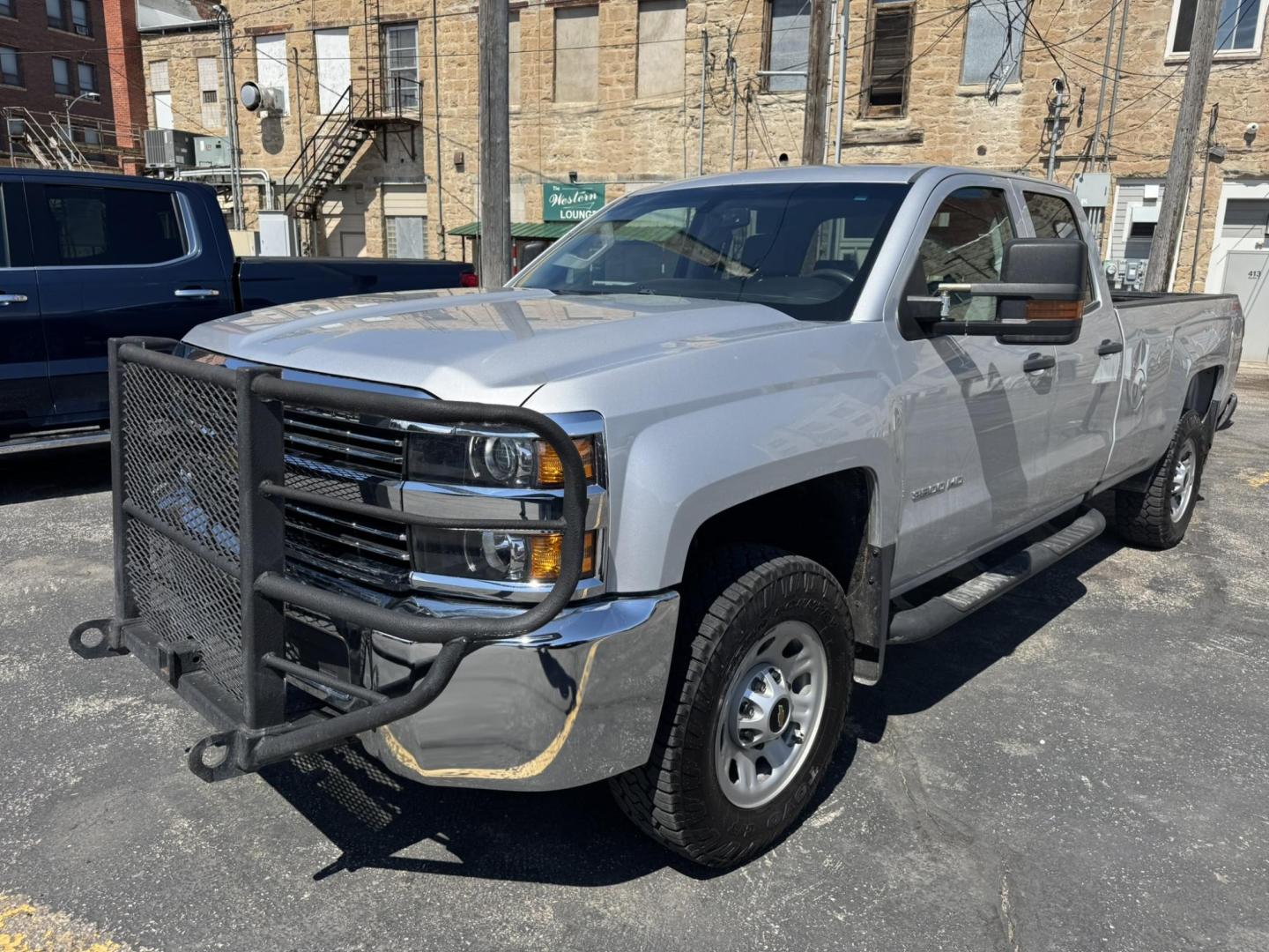 2018 Silver /Grey Chevrolet Silverado 3500HD Work Truck Double Cab Long Box 4WD (1GC2KYEG4JZ) with an 6.0L V8 OHV 16V FFV engine, 6A transmission, located at 116 5th Avenue South, Lewistown, MT, 59457, 47.063877, -109.427879 - If you need serious muscle, this 2018 Chevy Silverado 3500 HD 4x4 Work Truck is built to get the job done. Powered by a proven 6.0L V8 and paired with a heavy-duty 6-speed automatic, this long box double cab hauls, tows, and handles business without breaking a sweat. 4WD gives you confident tractio - Photo#7