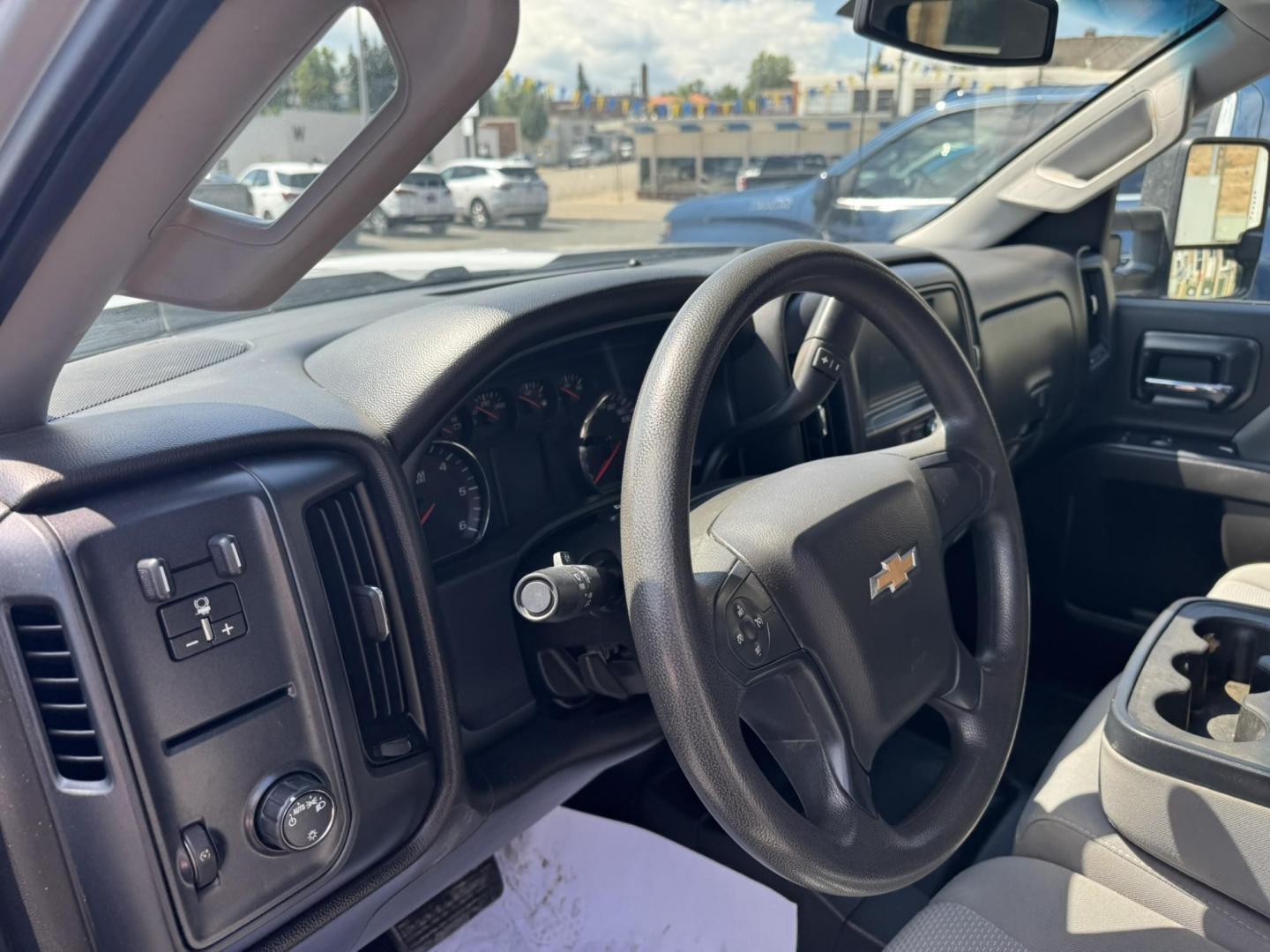 2018 Silver /Grey Chevrolet Silverado 3500HD Work Truck Double Cab Long Box 4WD (1GC2KYEG4JZ) with an 6.0L V8 OHV 16V FFV engine, 6A transmission, located at 116 5th Avenue South, Lewistown, MT, 59457, 47.063877, -109.427879 - If you need serious muscle, this 2018 Chevy Silverado 3500 HD 4x4 Work Truck is built to get the job done. Powered by a proven 6.0L V8 and paired with a heavy-duty 6-speed automatic, this long box double cab hauls, tows, and handles business without breaking a sweat. 4WD gives you confident tractio - Photo#9