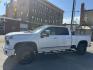 2024 WHITE /Black/Brown Chevrolet Silverado 2500HD High Country Crew Cab Short Box 4WD (1GC4YRE75RF) with an 6.6L V8 OHV 16V engine, 6A transmission, located at 116 5th Avenue South, Lewistown, MT, 59457, 47.063877, -109.427879 - Here’s the heavy-duty truck that checks every box. This 2024 Silverado 2500HD High Country gives you premium comfort and style with the capability you expect from a Chevy HD. Under the hood is the reliable 6.6L V8 gas engine paired with 4-wheel drive, built to tow, haul, and handle tough jobs with - Photo#1