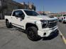 2024 WHITE /Black/Brown Chevrolet Silverado 2500HD High Country Crew Cab Short Box 4WD (1GC4YRE75RF) with an 6.6L V8 OHV 16V engine, 6A transmission, located at 116 5th Avenue South, Lewistown, MT, 59457, 47.063877, -109.427879 - Here’s the heavy-duty truck that checks every box. This 2024 Silverado 2500HD High Country gives you premium comfort and style with the capability you expect from a Chevy HD. Under the hood is the reliable 6.6L V8 gas engine paired with 4-wheel drive, built to tow, haul, and handle tough jobs with - Photo#7