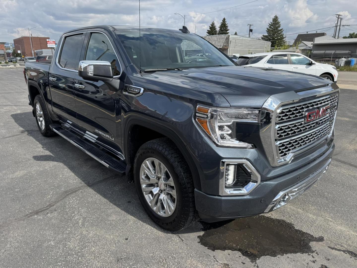 2021 Grey /Black GMC Sierra 1500 Denali Crew Cab 4WD (1GTU9FED7MZ) with an 5.3L V8 OHV 16V engine, 6A transmission, located at 116 5th Avenue South, Lewistown, MT, 59457, 47.063877, -109.427879 - his 2021 GMC Sierra Denali blends premium comfort with serious capability. With 4WD and powerful performance, it’s built to handle tough jobs, weekend towing, or just the daily drive in style. Inside, you’ll find a refined Denali interior with leather seating, advanced tech, and plenty of room f - Photo#0