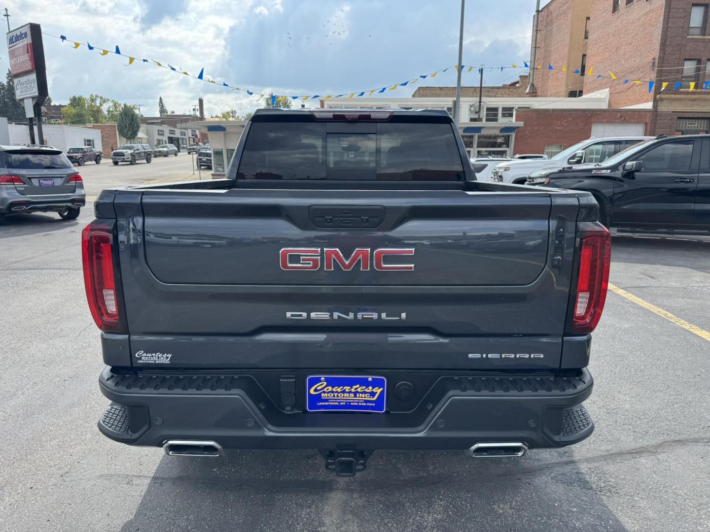 2021 Grey /Black GMC Sierra 1500 Denali Crew Cab 4WD (1GTU9FED7MZ) with an 5.3L V8 OHV 16V engine, 6A transmission, located at 116 5th Avenue South, Lewistown, MT, 59457, 47.063877, -109.427879 - his 2021 GMC Sierra Denali blends premium comfort with serious capability. With 4WD and powerful performance, it’s built to handle tough jobs, weekend towing, or just the daily drive in style. Inside, you’ll find a refined Denali interior with leather seating, advanced tech, and plenty of room f - Photo#3
