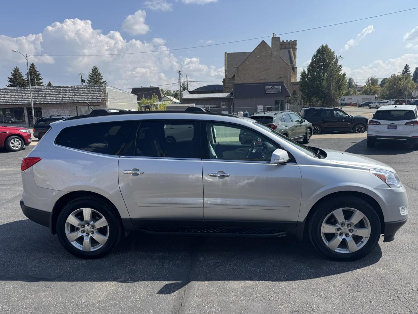 2012 Silver /Cream Chevrolet Traverse LTZ AWD (1GNKVLED7CJ) with an 3.6L V6 DOHC 24V engine, 6-Speed Automatic transmission, located at 116 5th Avenue South, Lewistown, MT, 59457, 47.063877, -109.427879 - LOCAL TRADE, WELL MAINTAINED AWD! - Photo#1