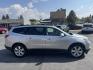 2012 Silver /Cream Chevrolet Traverse LTZ AWD (1GNKVLED7CJ) with an 3.6L V6 DOHC 24V engine, 6-Speed Automatic transmission, located at 116 5th Avenue South, Lewistown, MT, 59457, 47.063877, -109.427879 - LOCAL TRADE, WELL MAINTAINED AWD! - Photo#1
