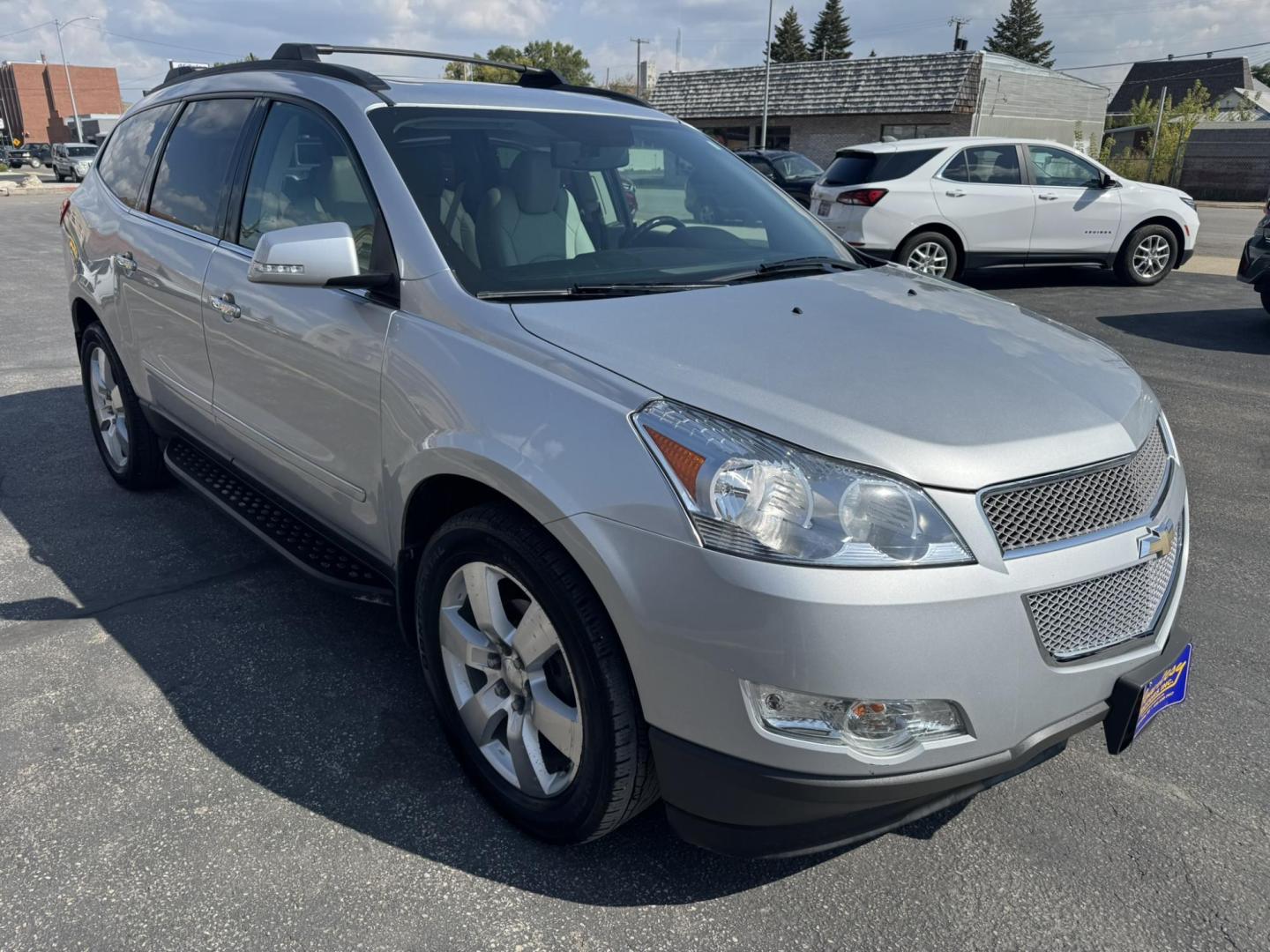 2012 Silver /Cream Chevrolet Traverse LTZ AWD (1GNKVLED7CJ) with an 3.6L V6 DOHC 24V engine, 6-Speed Automatic transmission, located at 116 5th Avenue South, Lewistown, MT, 59457, 47.063877, -109.427879 - LOCAL TRADE, WELL MAINTAINED AWD! - Photo#0