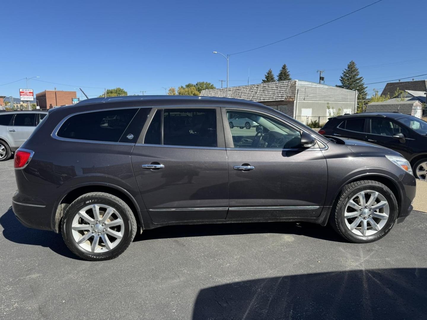 2016 Charcoal /Black Buick Enclave Premium AWD (5GAKVCKD9GJ) with an 3.6L V6 DOHC 24V engine, 6A transmission, located at 116 5th Avenue South, Lewistown, MT, 59457, 47.063877, -109.427879 - Ride in comfort and style with this 2016 Buick Enclave Premium AWD, a spacious SUV designed for families and drivers who want luxury without compromise. With its bold exterior, quiet cabin, and advanced features, the Enclave delivers the perfect balance of elegance and practicality. The Premium tri - Photo#1