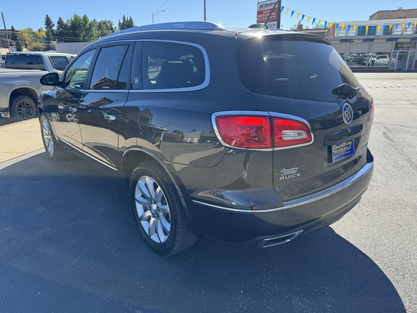 2016 Charcoal /Black Buick Enclave Premium AWD (5GAKVCKD9GJ) with an 3.6L V6 DOHC 24V engine, 6A transmission, located at 116 5th Avenue South, Lewistown, MT, 59457, 47.063877, -109.427879 - Ride in comfort and style with this 2016 Buick Enclave Premium AWD, a spacious SUV designed for families and drivers who want luxury without compromise. With its bold exterior, quiet cabin, and advanced features, the Enclave delivers the perfect balance of elegance and practicality. The Premium tri - Photo#4