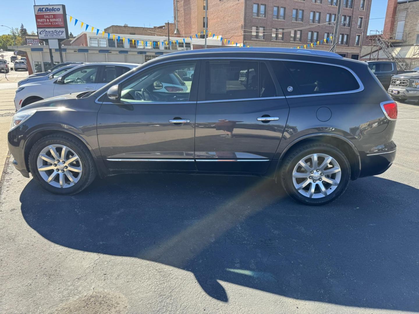 2016 Charcoal /Black Buick Enclave Premium AWD (5GAKVCKD9GJ) with an 3.6L V6 DOHC 24V engine, 6A transmission, located at 116 5th Avenue South, Lewistown, MT, 59457, 47.063877, -109.427879 - Ride in comfort and style with this 2016 Buick Enclave Premium AWD, a spacious SUV designed for families and drivers who want luxury without compromise. With its bold exterior, quiet cabin, and advanced features, the Enclave delivers the perfect balance of elegance and practicality. The Premium tri - Photo#5