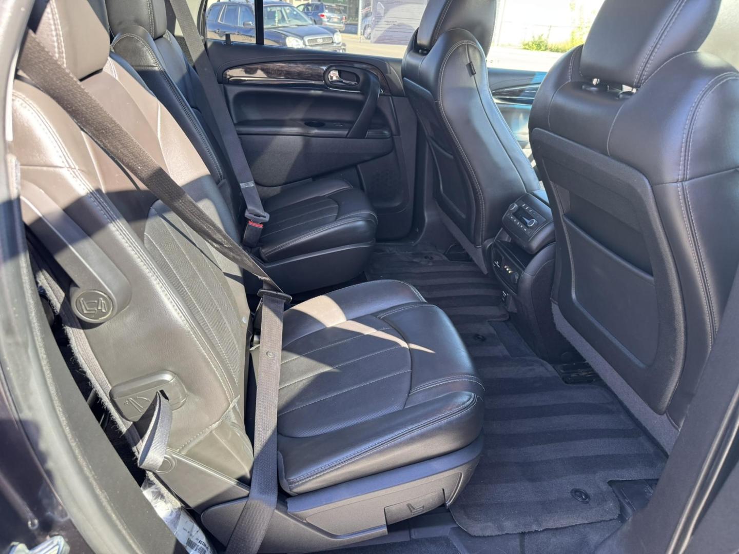 2016 Charcoal /Black Buick Enclave Premium AWD (5GAKVCKD9GJ) with an 3.6L V6 DOHC 24V engine, 6A transmission, located at 116 5th Avenue South, Lewistown, MT, 59457, 47.063877, -109.427879 - Ride in comfort and style with this 2016 Buick Enclave Premium AWD, a spacious SUV designed for families and drivers who want luxury without compromise. With its bold exterior, quiet cabin, and advanced features, the Enclave delivers the perfect balance of elegance and practicality. The Premium tri - Photo#8