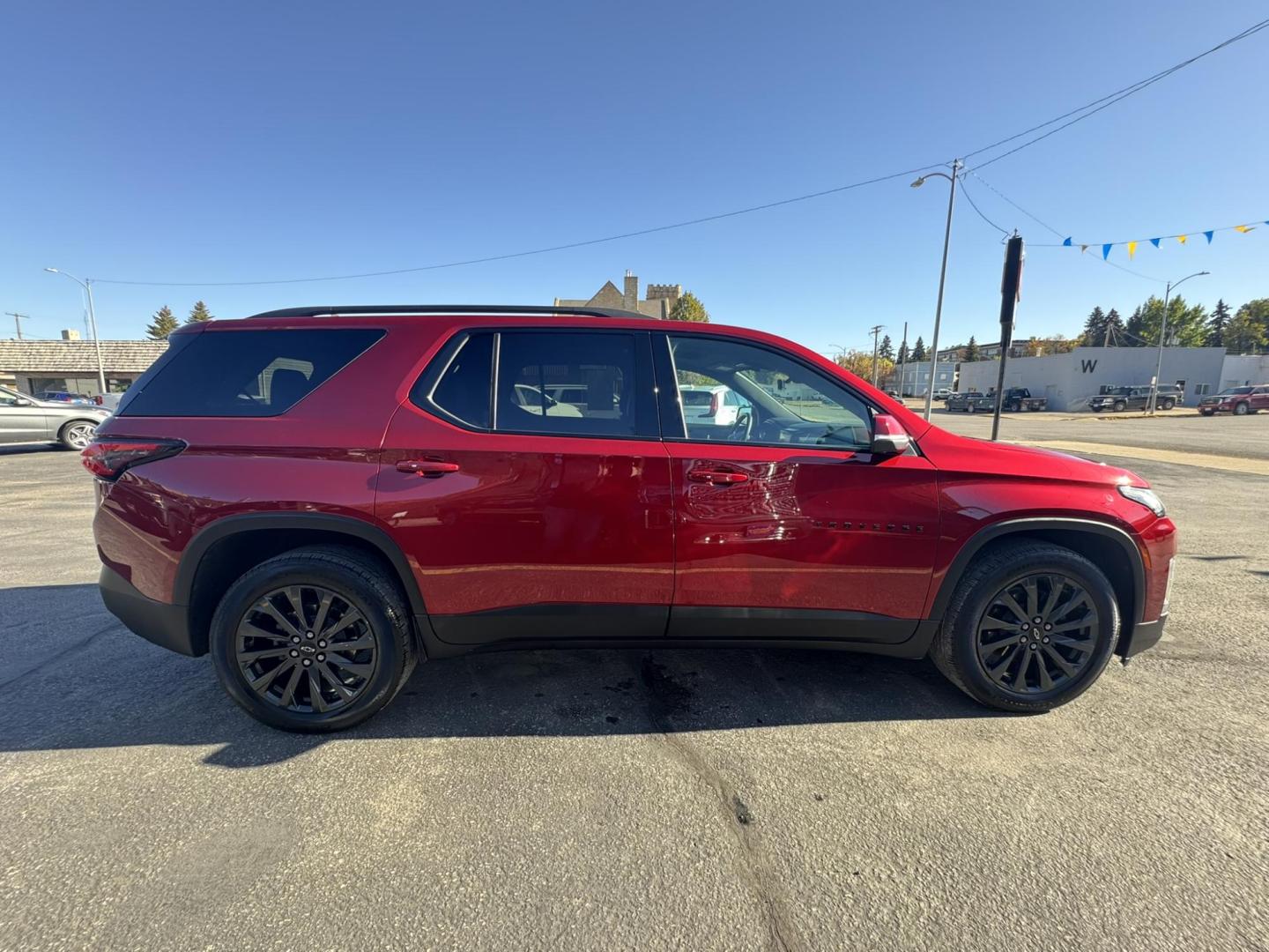 2023 Maroon /Black Chevrolet Traverse RS AWD (1GNEVJKW2PJ) with an 3.6L V6 DOHC 24V engine, 9A transmission, located at 116 5th Avenue South, Lewistown, MT, 59457, 47.063877, -109.427879 - Sporty, spacious, and ready for family adventures. This 2023 Traverse RS combines the comfort of a luxury SUV with the performance of a sport-tuned ride. Powered by a 3.6L V6 with All-Wheel Drive, it delivers confident handling in all weather. The RS trim adds a bold blacked-out exterior, 20-inch wh - Photo#1