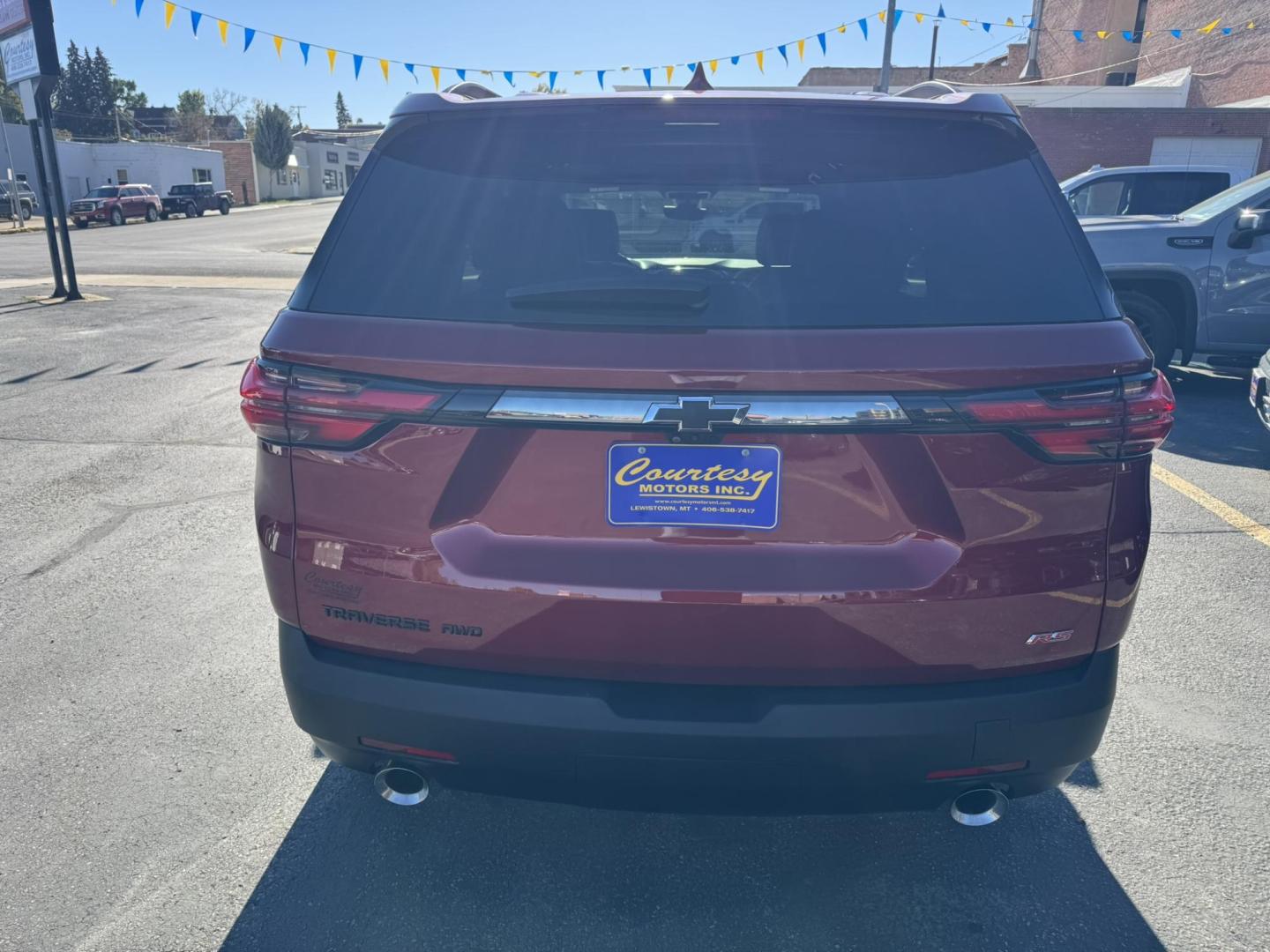 2023 Maroon /Black Chevrolet Traverse RS AWD (1GNEVJKW2PJ) with an 3.6L V6 DOHC 24V engine, 9A transmission, located at 116 5th Avenue South, Lewistown, MT, 59457, 47.063877, -109.427879 - Sporty, spacious, and ready for family adventures. This 2023 Traverse RS combines the comfort of a luxury SUV with the performance of a sport-tuned ride. Powered by a 3.6L V6 with All-Wheel Drive, it delivers confident handling in all weather. The RS trim adds a bold blacked-out exterior, 20-inch wh - Photo#3