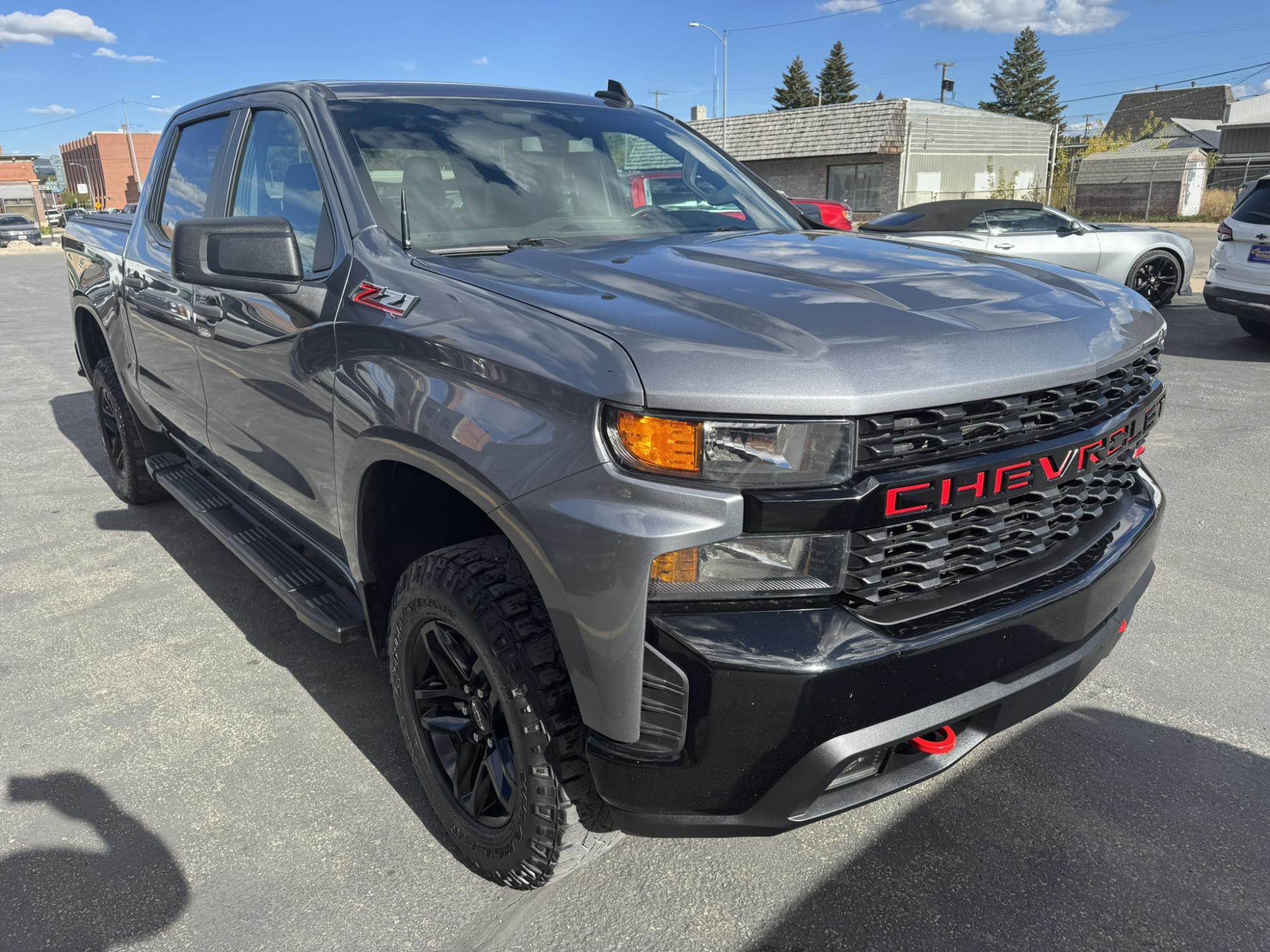 photo of 2021 Chevrolet Silverado 1500 Custom Trail Boss Crew Cab Short Box 4WD
