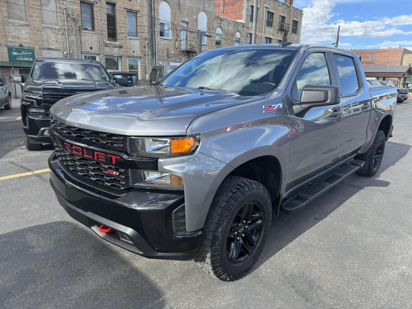 2021 Grey /Black Chevrolet Silverado 1500 Custom Trail Boss Crew Cab Short Box 4WD (1GCPYCEF8MZ) with an 5.3L V8 OHV 16V engine, 6A transmission, located at 116 5th Avenue South, Lewistown, MT, 59457, 47.063877, -109.427879 - 2021 Chevrolet Silverado 1500 Custom Trail Boss 4WD – Lifted from the Factory and Ready to Roll! Built for adventure, this 2021 Silverado Custom Trail Boss brings rugged style and off-road performance straight from the factory. Powered by a 5.3L V8 and paired with a true 4WD system, it features - Photo#7