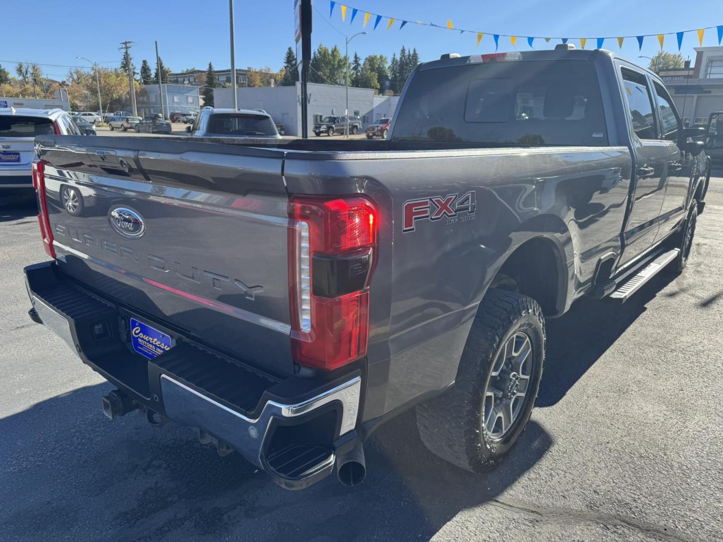 2023 Grey /Black Ford F-350 SD Lariat Crew Cab Long Bed 4WD (1FT8W3BN0PE) with an 7.3L V8 OHV 16V engine, 6A transmission, located at 116 5th Avenue South, Lewistown, MT, 59457, 47.063877, -109.427879 - Photo#2
