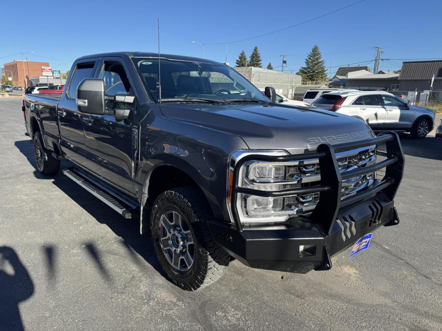 2023 Grey /Black Ford F-350 SD Lariat Crew Cab Long Bed 4WD (1FT8W3BN0PE) with an 7.3L V8 OHV 16V engine, 6A transmission, located at 116 5th Avenue South, Lewistown, MT, 59457, 47.063877, -109.427879 - Photo#0