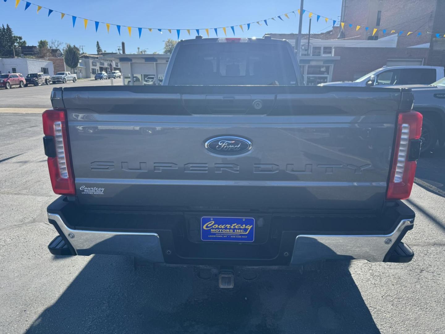 2023 Grey /Black Ford F-350 SD Lariat Crew Cab Long Bed 4WD (1FT8W3BN0PE) with an 7.3L V8 OHV 16V engine, 6A transmission, located at 116 5th Avenue South, Lewistown, MT, 59457, 47.063877, -109.427879 - Photo#3