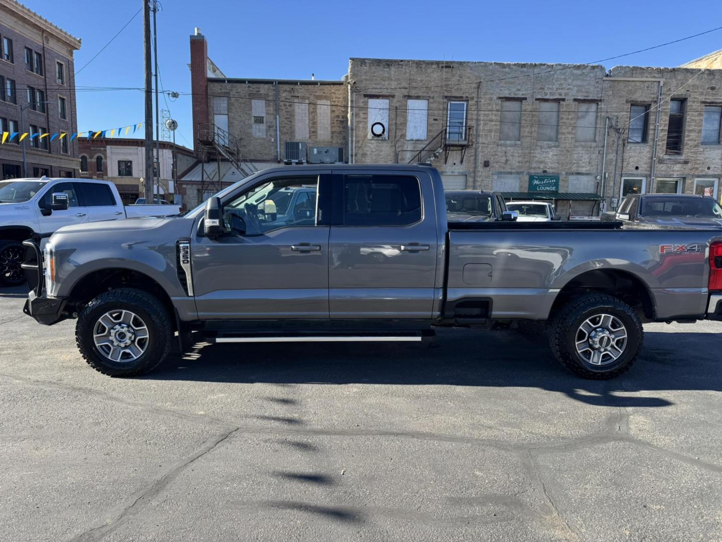 2023 Grey /Black Ford F-350 SD Lariat Crew Cab Long Bed 4WD (1FT8W3BN0PE) with an 7.3L V8 OHV 16V engine, 6A transmission, located at 116 5th Avenue South, Lewistown, MT, 59457, 47.063877, -109.427879 - Photo#6