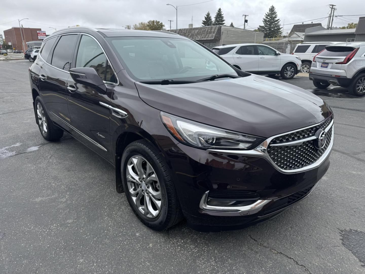 2021 Maroon /Brown Buick Enclave Avenir AWD (5GAEVCKWXMJ) with an 3.6L V6 DOHC 24V engine, 9A transmission, located at 116 5th Avenue South, Lewistown, MT, 59457, 47.063877, -109.427879 - Experience premium comfort and style in this 2021 Buick Enclave Avenir AWD — Buick’s flagship SUV that blends first-class luxury with confident performance. This one delivers everything you’d expect from the Avenir line: a beautifully refined interior with quilted leather seating, woodgrain tr - Photo#0