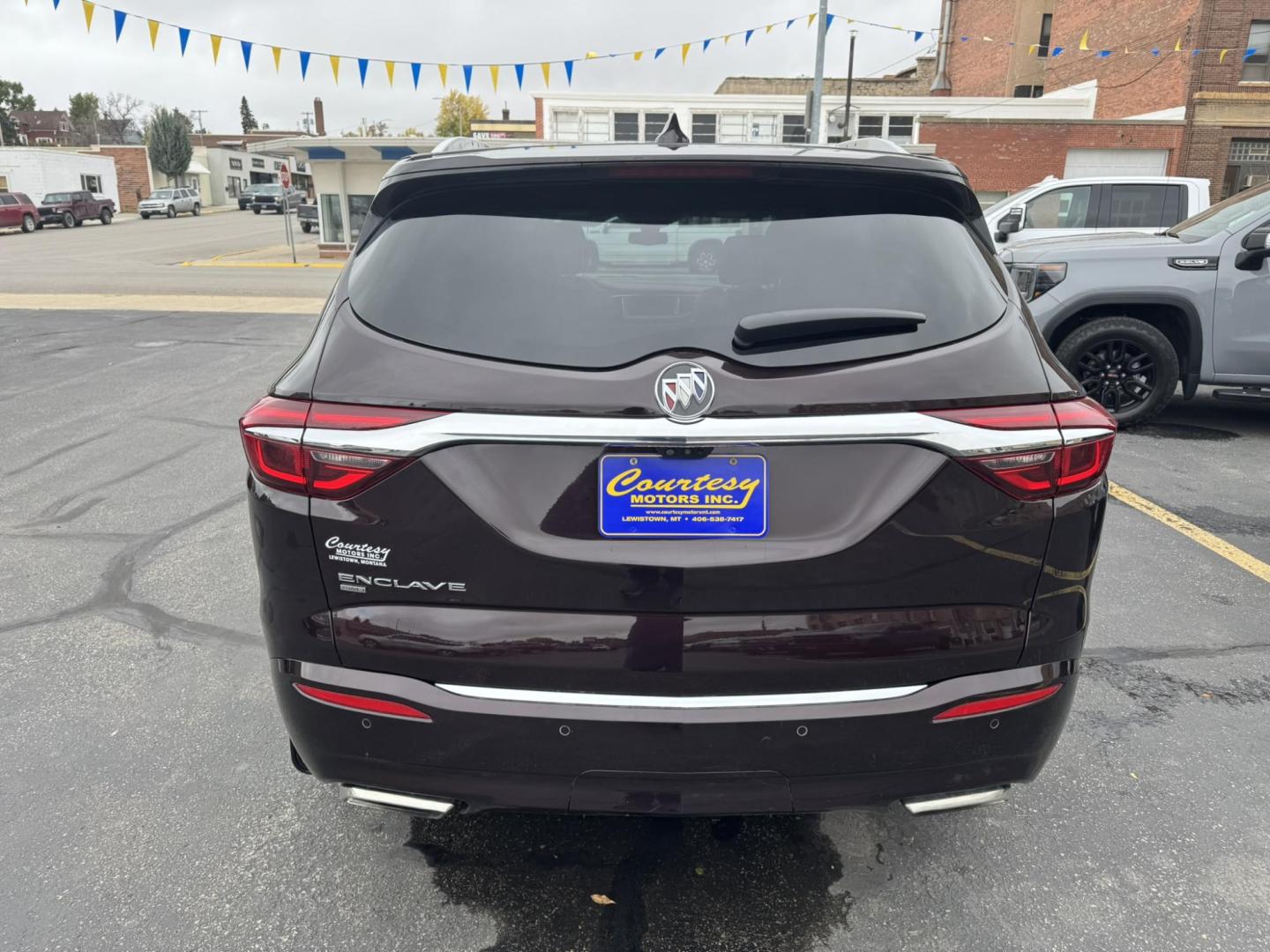 2021 Maroon /Brown Buick Enclave Avenir AWD (5GAEVCKWXMJ) with an 3.6L V6 DOHC 24V engine, 9A transmission, located at 116 5th Avenue South, Lewistown, MT, 59457, 47.063877, -109.427879 - Experience premium comfort and style in this 2021 Buick Enclave Avenir AWD — Buick’s flagship SUV that blends first-class luxury with confident performance. This one delivers everything you’d expect from the Avenir line: a beautifully refined interior with quilted leather seating, woodgrain tr - Photo#3