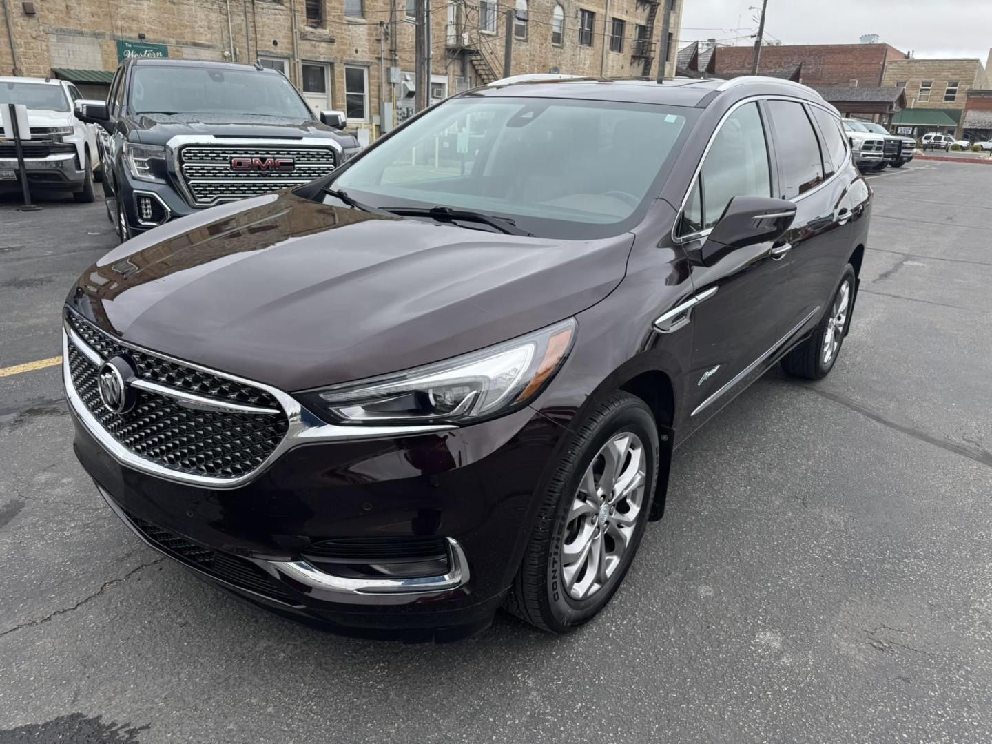 2021 Maroon /Brown Buick Enclave Avenir AWD (5GAEVCKWXMJ) with an 3.6L V6 DOHC 24V engine, 9A transmission, located at 116 5th Avenue South, Lewistown, MT, 59457, 47.063877, -109.427879 - Experience premium comfort and style in this 2021 Buick Enclave Avenir AWD — Buick’s flagship SUV that blends first-class luxury with confident performance. This one delivers everything you’d expect from the Avenir line: a beautifully refined interior with quilted leather seating, woodgrain tr - Photo#6