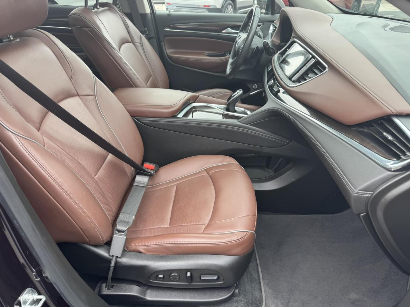 2021 Maroon /Brown Buick Enclave Avenir AWD (5GAEVCKWXMJ) with an 3.6L V6 DOHC 24V engine, 9A transmission, located at 116 5th Avenue South, Lewistown, MT, 59457, 47.063877, -109.427879 - Experience premium comfort and style in this 2021 Buick Enclave Avenir AWD — Buick’s flagship SUV that blends first-class luxury with confident performance. This one delivers everything you’d expect from the Avenir line: a beautifully refined interior with quilted leather seating, woodgrain tr - Photo#7