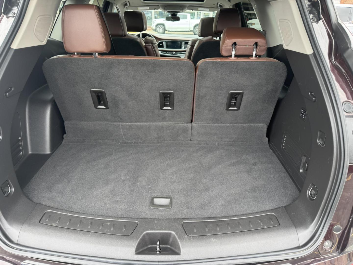2021 Maroon /Brown Buick Enclave Avenir AWD (5GAEVCKWXMJ) with an 3.6L V6 DOHC 24V engine, 9A transmission, located at 116 5th Avenue South, Lewistown, MT, 59457, 47.063877, -109.427879 - Experience premium comfort and style in this 2021 Buick Enclave Avenir AWD — Buick’s flagship SUV that blends first-class luxury with confident performance. This one delivers everything you’d expect from the Avenir line: a beautifully refined interior with quilted leather seating, woodgrain tr - Photo#12
