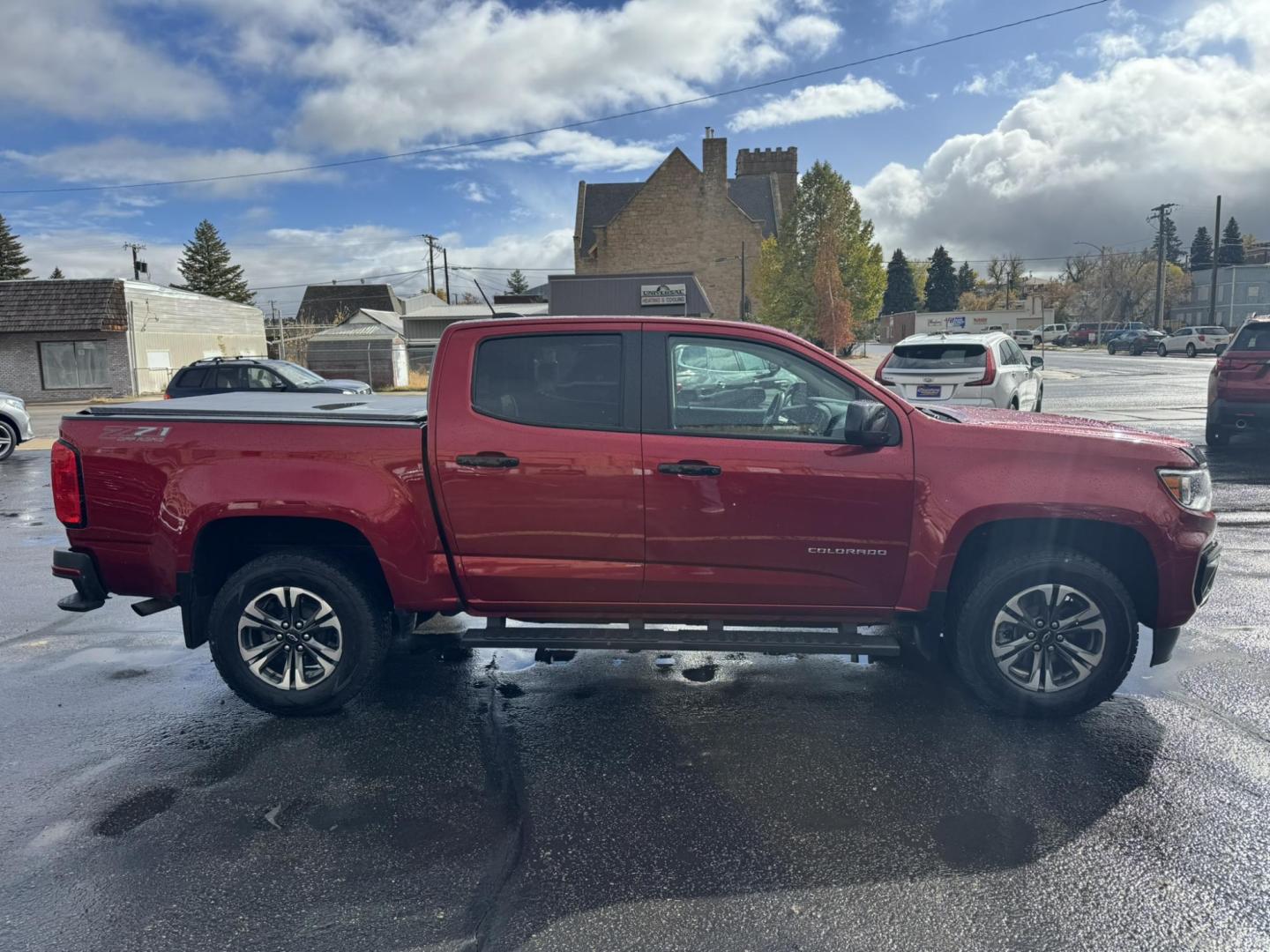 2021 Maroon /Black Chevrolet Colorado Z71 Crew Cab Long Box 4WD (1GCGTDEN8M1) with an 3.6L V6 DOHC 24V GAS engine, 6A transmission, located at 116 5th Avenue South, Lewistown, MT, 59457, 47.063877, -109.427879 - Photo#1