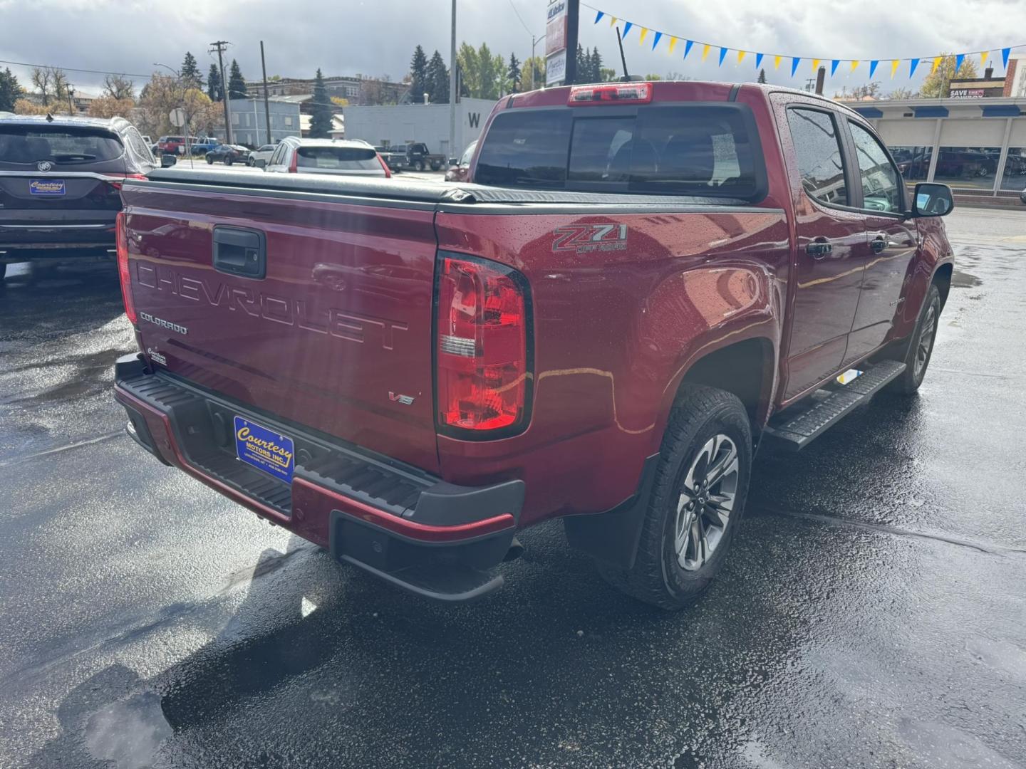 2021 Maroon /Black Chevrolet Colorado Z71 Crew Cab Long Box 4WD (1GCGTDEN8M1) with an 3.6L V6 DOHC 24V GAS engine, 6A transmission, located at 116 5th Avenue South, Lewistown, MT, 59457, 47.063877, -109.427879 - Photo#2