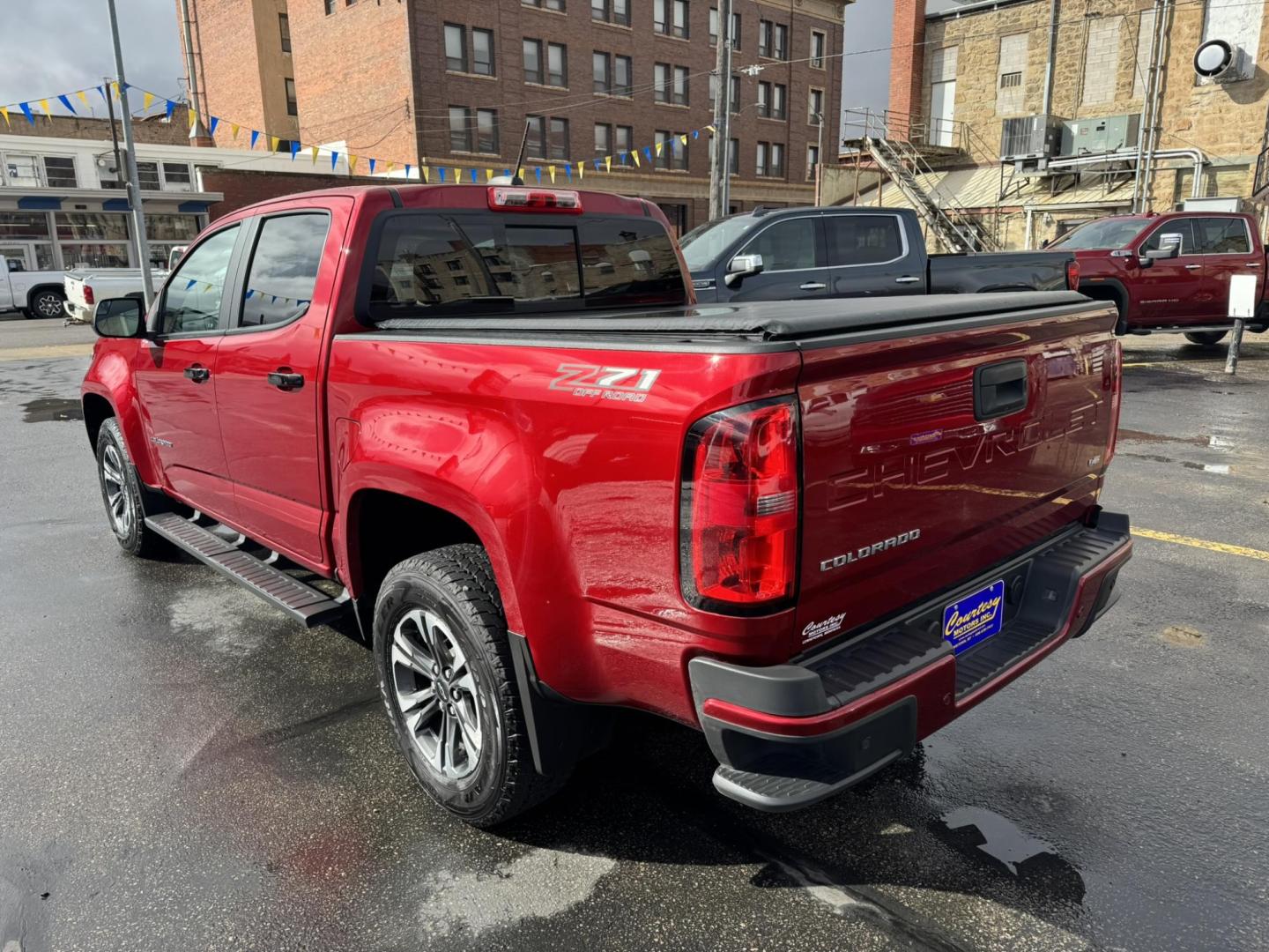 2021 Maroon /Black Chevrolet Colorado Z71 Crew Cab Long Box 4WD (1GCGTDEN8M1) with an 3.6L V6 DOHC 24V GAS engine, 6A transmission, located at 116 5th Avenue South, Lewistown, MT, 59457, 47.063877, -109.427879 - Photo#4
