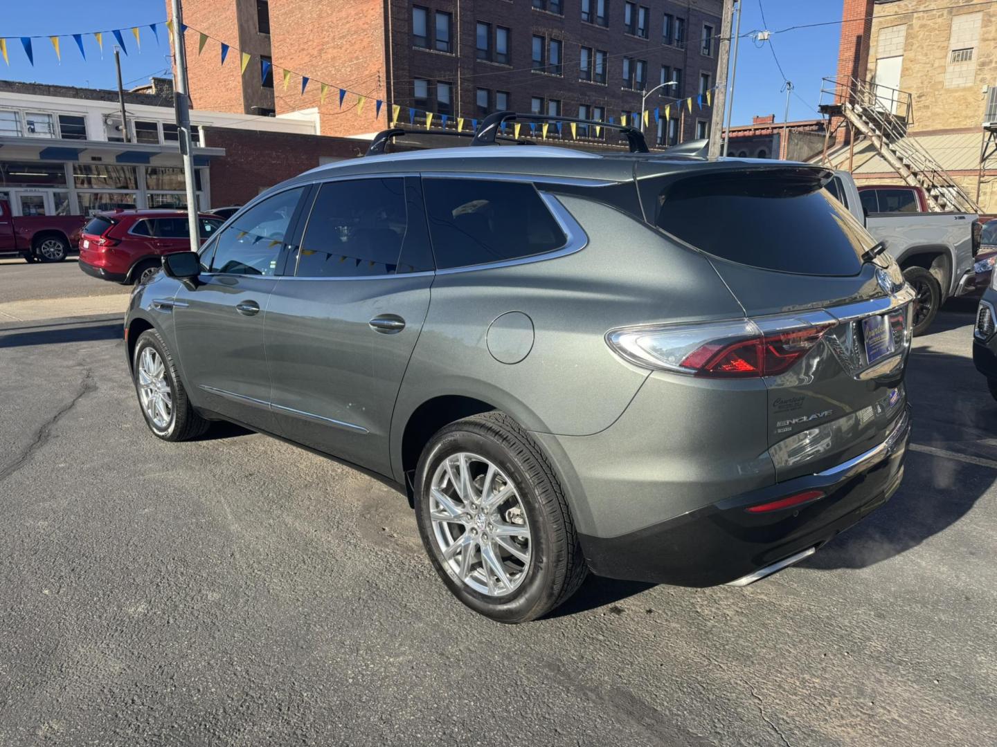 2023 Green /Grey Buick Enclave Premium AWD (5GAEVBKWXPJ) with an 3.6L V6 DOHC 24V engine, 9A transmission, located at 116 5th Avenue South, Lewistown, MT, 59457, 47.063877, -109.427879 - **2023 Buick Enclave Premium AWD** — GM Lease Return, Clean One-Owner Car ax. This Enclave delivers that quiet, upscale ride Buick is known for, with room for the whole family and all the comfort features you expect in the Premium trim. Leather seating, heated and cooled front seats, heated second - Photo#2
