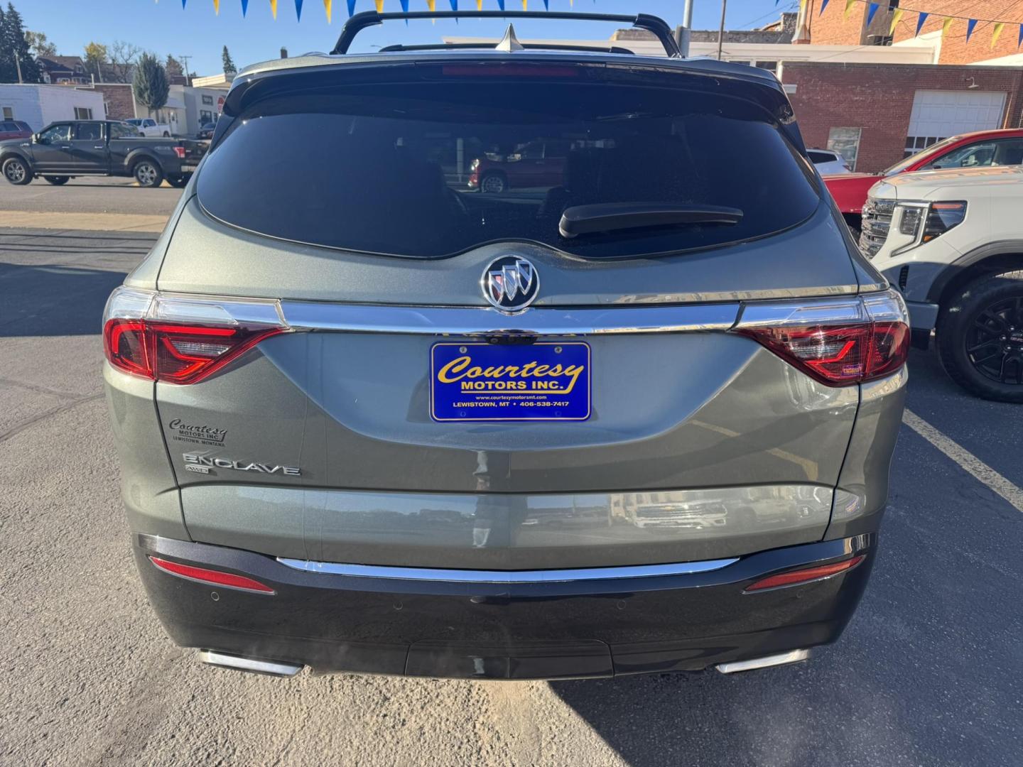 2023 Green /Grey Buick Enclave Premium AWD (5GAEVBKWXPJ) with an 3.6L V6 DOHC 24V engine, 9A transmission, located at 116 5th Avenue South, Lewistown, MT, 59457, 47.063877, -109.427879 - **2023 Buick Enclave Premium AWD** — GM Lease Return, Clean One-Owner Car ax. This Enclave delivers that quiet, upscale ride Buick is known for, with room for the whole family and all the comfort features you expect in the Premium trim. Leather seating, heated and cooled front seats, heated second - Photo#3