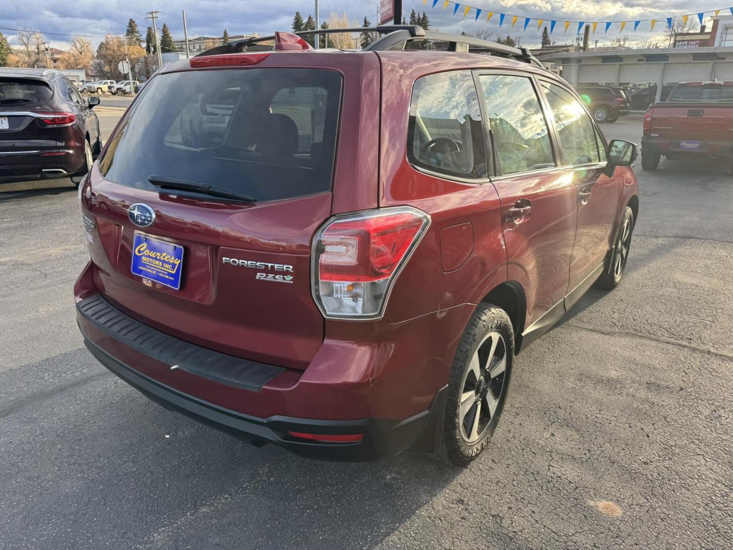 2017 Maroon /Grey Subaru Forester 2.5i Premium PZEV CVT (JF2SJABCXHH) with an 2.5L H4 SOHC 16V engine, CVT transmission, located at 116 5th Avenue South, Lewistown, MT, 59457, 47.063877, -109.427879 - Clean One Owner Car Fax, local trade! - Photo#2