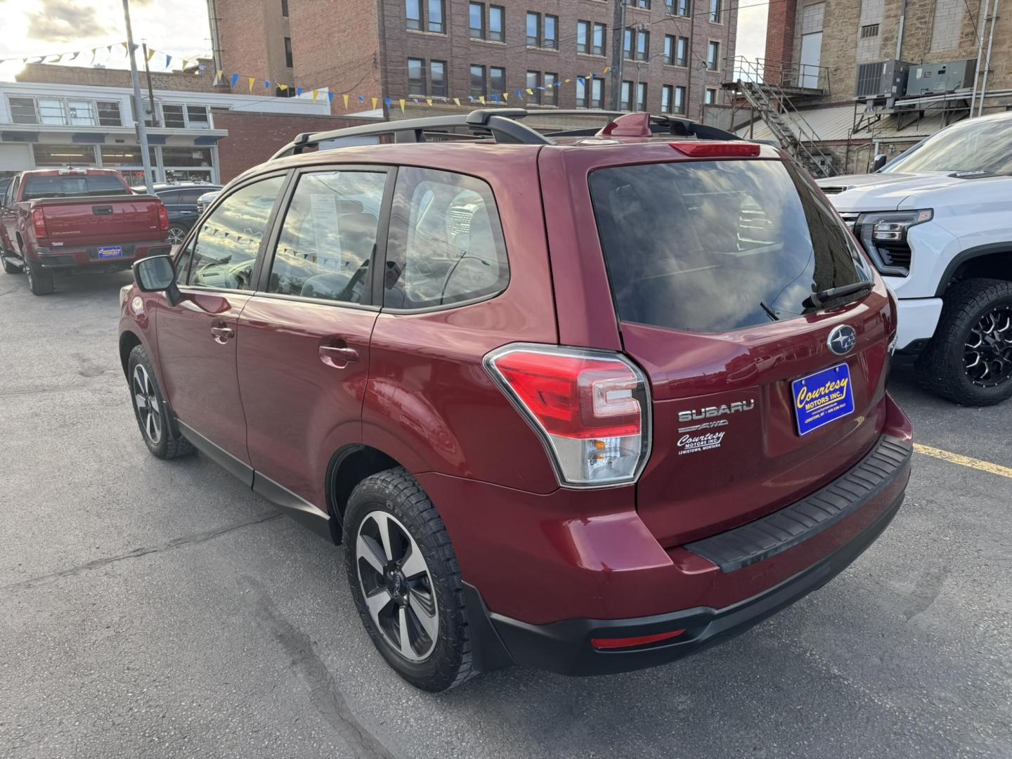 2017 Maroon /Grey Subaru Forester 2.5i Premium PZEV CVT (JF2SJABCXHH) with an 2.5L H4 SOHC 16V engine, CVT transmission, located at 116 5th Avenue South, Lewistown, MT, 59457, 47.063877, -109.427879 - Clean One Owner Car Fax, local trade! - Photo#4