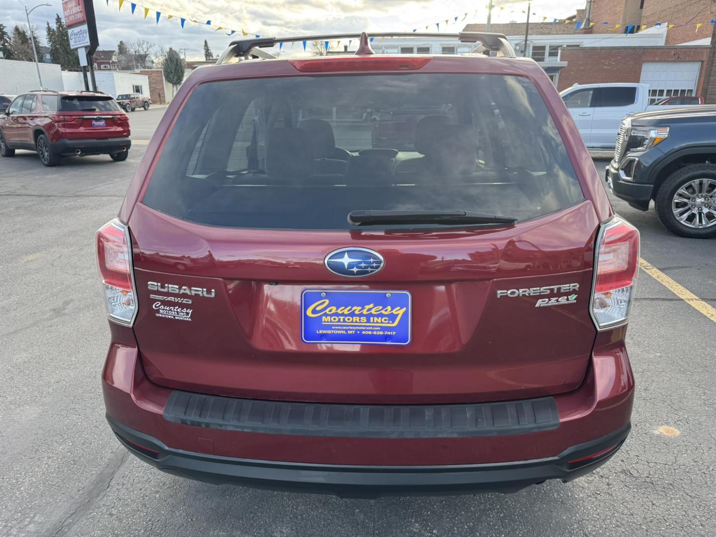 2017 Maroon /Grey Subaru Forester 2.5i Premium PZEV CVT (JF2SJABCXHH) with an 2.5L H4 SOHC 16V engine, CVT transmission, located at 116 5th Avenue South, Lewistown, MT, 59457, 47.063877, -109.427879 - Clean One Owner Car Fax, local trade! - Photo#3
