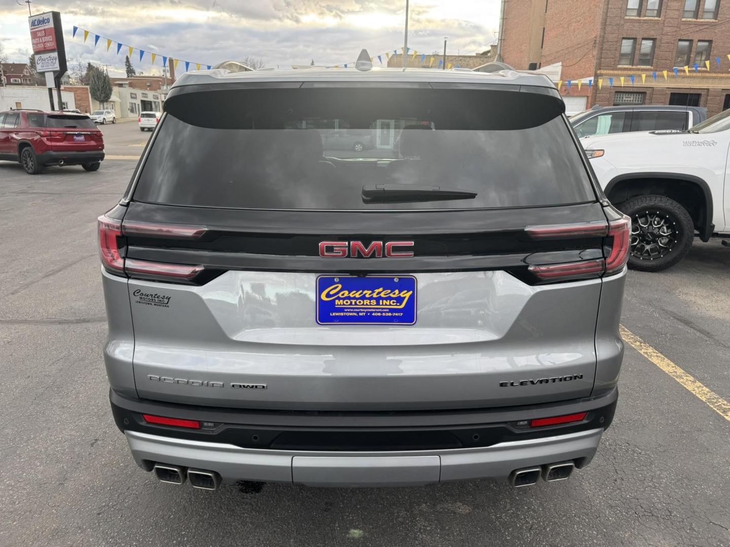 2024 Silver /Black GMC Acadia Elevation AWD (1GKENNKS0RJ) with an 2.5L L4 DOHC 16V engine, 9A transmission, located at 116 5th Avenue South, Lewistown, MT, 59457, 47.063877, -109.427879 - Just arrived — a 2024 GMC Acadia Elevation AWD, and it’s the right build. This one comes with the Elevation appearance package, a full leather interior, and the updated body style that looks sharp from every angle. You get confident AWD for winter, a smooth turbo powertrain, three-row seating, a - Photo#3