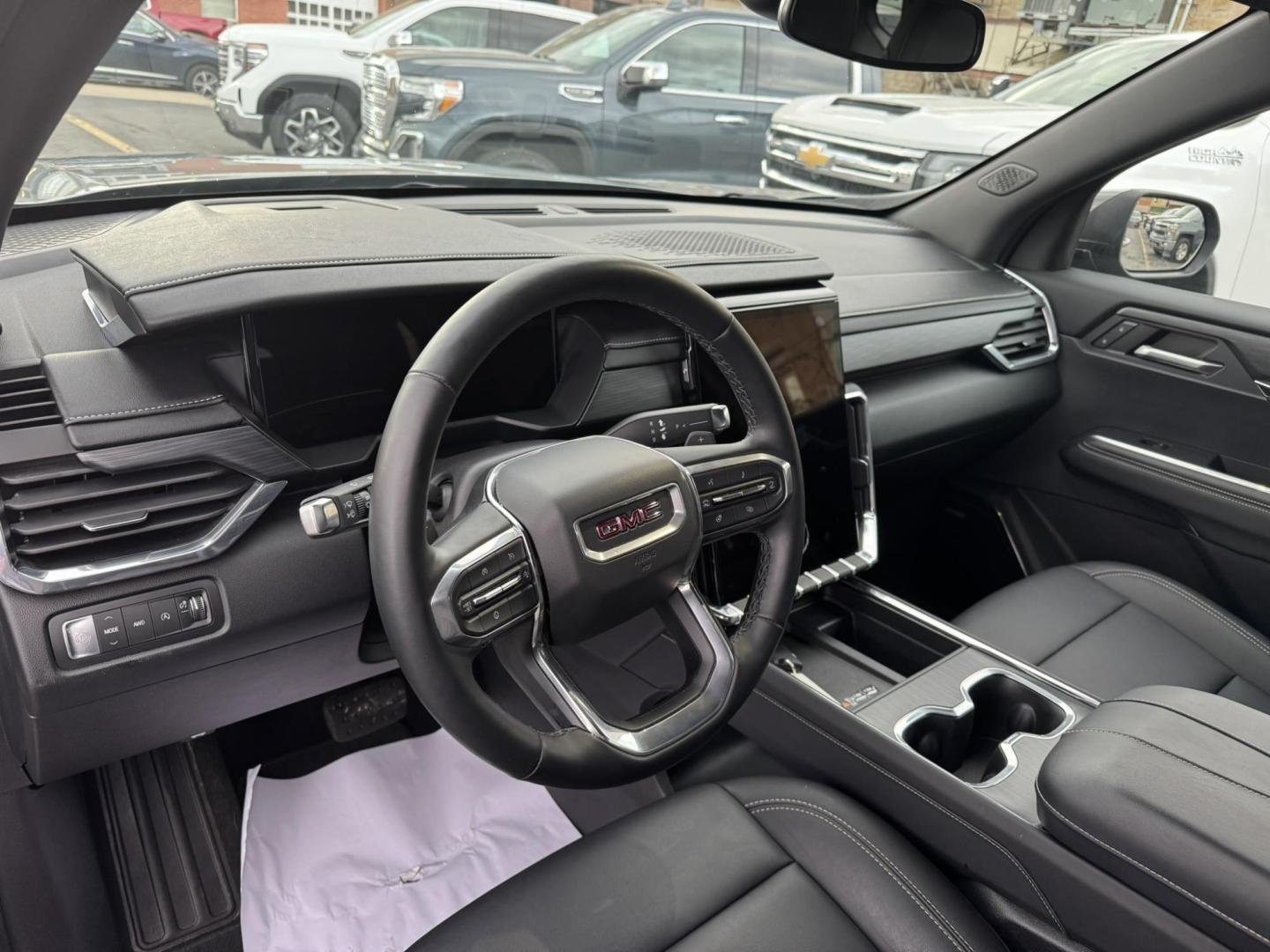 2024 Silver /Black GMC Acadia Elevation AWD (1GKENNKS0RJ) with an 2.5L L4 DOHC 16V engine, 9A transmission, located at 116 5th Avenue South, Lewistown, MT, 59457, 47.063877, -109.427879 - Just arrived — a 2024 GMC Acadia Elevation AWD, and it’s the right build. This one comes with the Elevation appearance package, a full leather interior, and the updated body style that looks sharp from every angle. You get confident AWD for winter, a smooth turbo powertrain, three-row seating, a - Photo#17