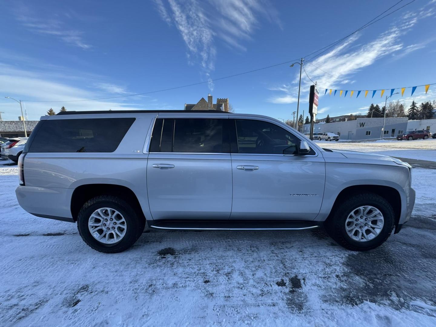 2015 Silver /Tan GMC Yukon XL SLT 1/2 Ton 4WD (1GKS2HKC4FR) with an 5.3L V8 OHV 16V engine, 6-Speed Automatic transmission, located at 116 5th Avenue South, Lewistown, MT, 59457, 47.063877, -109.427879 - Photo#1