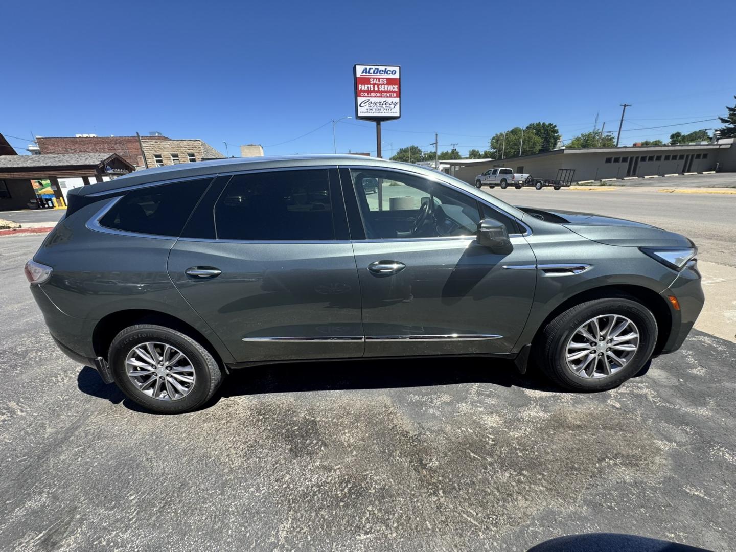 2022 Green /Grey Buick Enclave Premium AWD (5GAEVBKW6NJ) with an 3.6L V6 DOHC 24V engine, 9A transmission, located at 116 5th Avenue South, Lewistown, MT, 59457, 47.063877, -109.427879 - This 2022 Buick Enclave Premium AWD is the perfect mix of comfort, space, and confidence. Smooth-riding all-wheel drive makes it ideal year-round, while the Premium trim delivers the upscale feel Buick is known for. Leather seating, heated front seats, a power panoramic sunroof, and a quiet, refined- Photo#1
