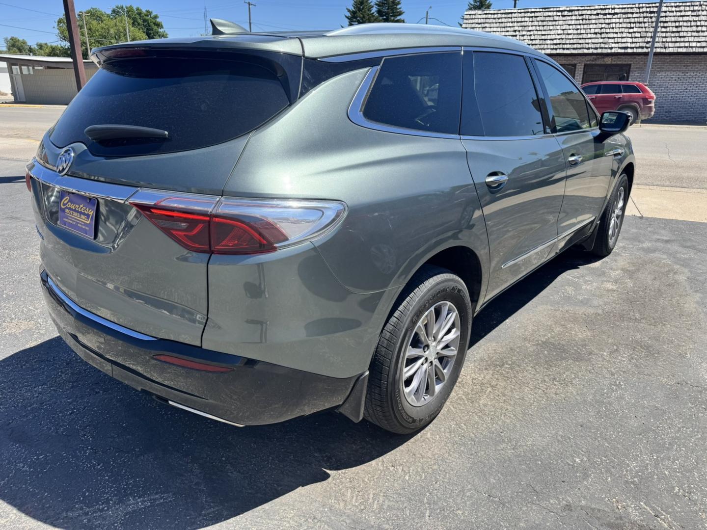 2022 Green /Grey Buick Enclave Premium AWD (5GAEVBKW6NJ) with an 3.6L V6 DOHC 24V engine, 9A transmission, located at 116 5th Avenue South, Lewistown, MT, 59457, 47.063877, -109.427879 - This 2022 Buick Enclave Premium AWD is the perfect mix of comfort, space, and confidence. Smooth-riding all-wheel drive makes it ideal year-round, while the Premium trim delivers the upscale feel Buick is known for. Leather seating, heated front seats, a power panoramic sunroof, and a quiet, refined- Photo#2