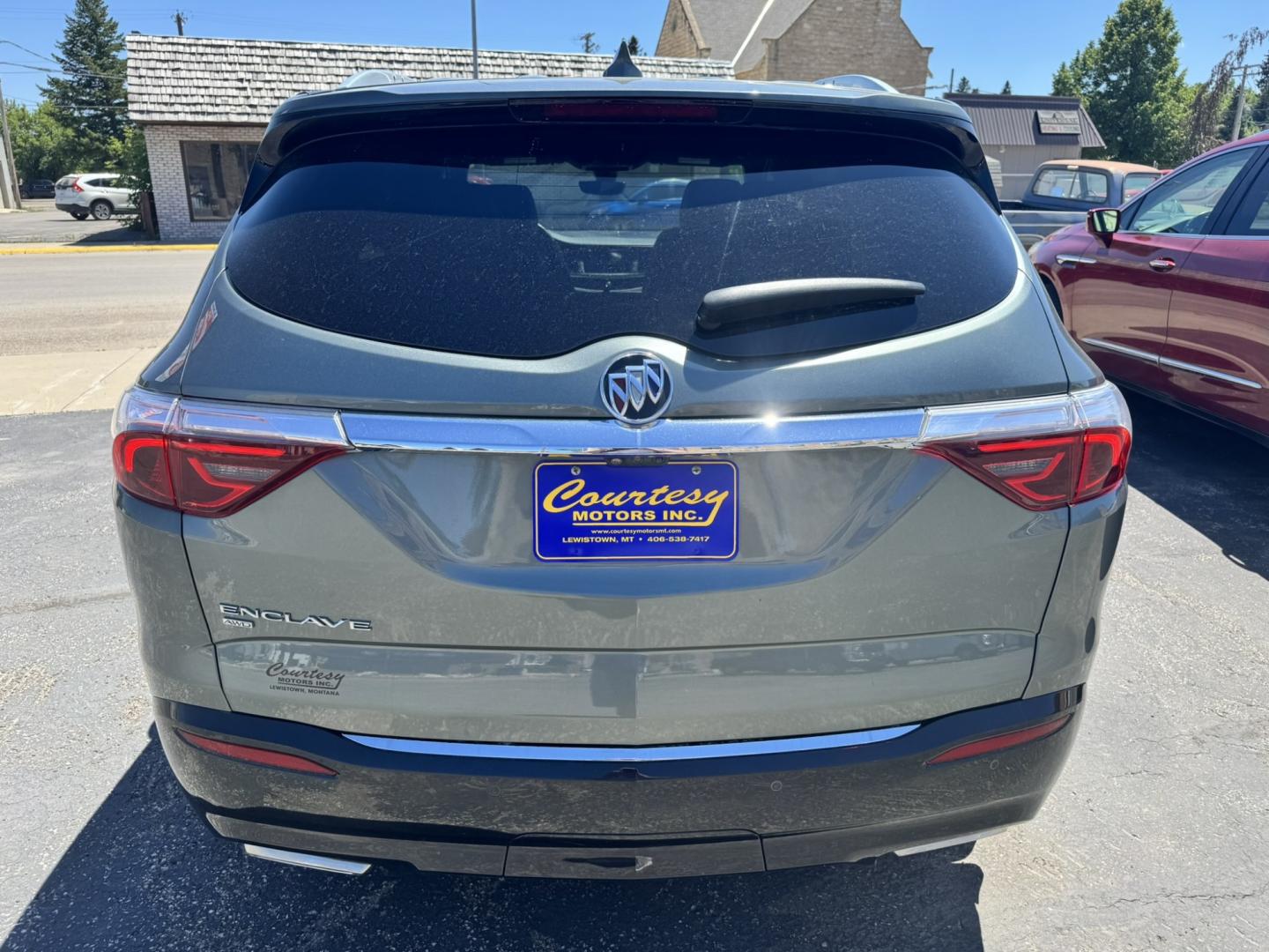 2022 Green /Grey Buick Enclave Premium AWD (5GAEVBKW6NJ) with an 3.6L V6 DOHC 24V engine, 9A transmission, located at 116 5th Avenue South, Lewistown, MT, 59457, 47.063877, -109.427879 - This 2022 Buick Enclave Premium AWD is the perfect mix of comfort, space, and confidence. Smooth-riding all-wheel drive makes it ideal year-round, while the Premium trim delivers the upscale feel Buick is known for. Leather seating, heated front seats, a power panoramic sunroof, and a quiet, refined- Photo#3