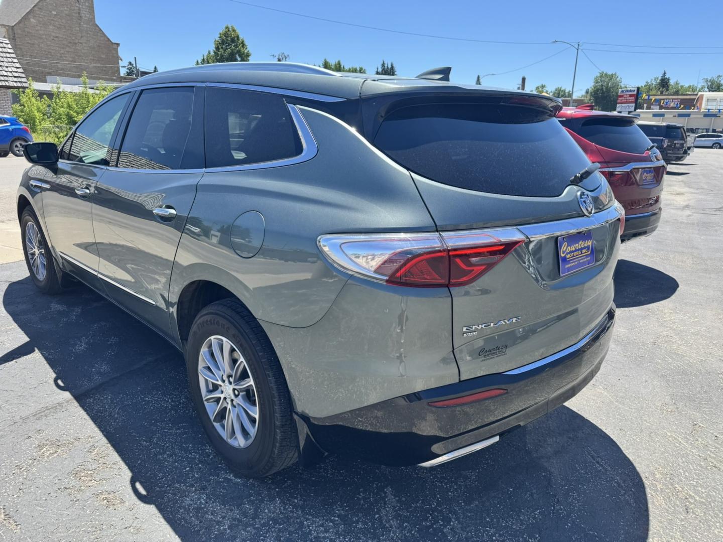 2022 Green /Grey Buick Enclave Premium AWD (5GAEVBKW6NJ) with an 3.6L V6 DOHC 24V engine, 9A transmission, located at 116 5th Avenue South, Lewistown, MT, 59457, 47.063877, -109.427879 - This 2022 Buick Enclave Premium AWD is the perfect mix of comfort, space, and confidence. Smooth-riding all-wheel drive makes it ideal year-round, while the Premium trim delivers the upscale feel Buick is known for. Leather seating, heated front seats, a power panoramic sunroof, and a quiet, refined- Photo#4