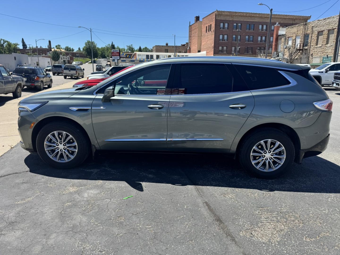 2022 Green /Grey Buick Enclave Premium AWD (5GAEVBKW6NJ) with an 3.6L V6 DOHC 24V engine, 9A transmission, located at 116 5th Avenue South, Lewistown, MT, 59457, 47.063877, -109.427879 - This 2022 Buick Enclave Premium AWD is the perfect mix of comfort, space, and confidence. Smooth-riding all-wheel drive makes it ideal year-round, while the Premium trim delivers the upscale feel Buick is known for. Leather seating, heated front seats, a power panoramic sunroof, and a quiet, refined- Photo#5
