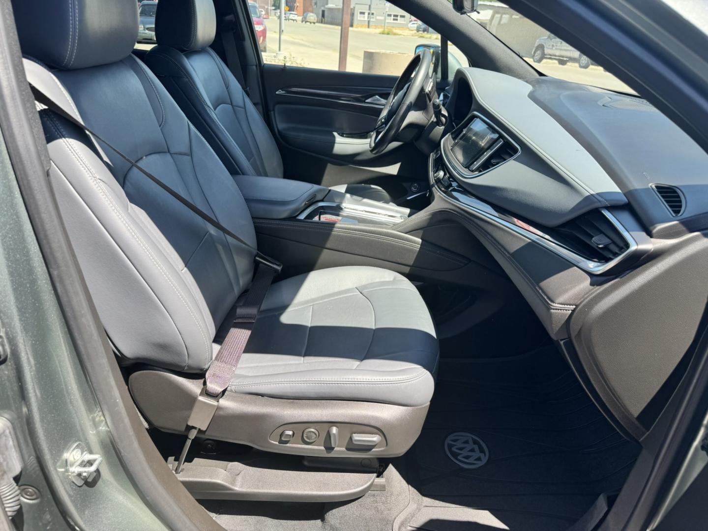2022 Green /Grey Buick Enclave Premium AWD (5GAEVBKW6NJ) with an 3.6L V6 DOHC 24V engine, 9A transmission, located at 116 5th Avenue South, Lewistown, MT, 59457, 47.063877, -109.427879 - This 2022 Buick Enclave Premium AWD is the perfect mix of comfort, space, and confidence. Smooth-riding all-wheel drive makes it ideal year-round, while the Premium trim delivers the upscale feel Buick is known for. Leather seating, heated front seats, a power panoramic sunroof, and a quiet, refined- Photo#7