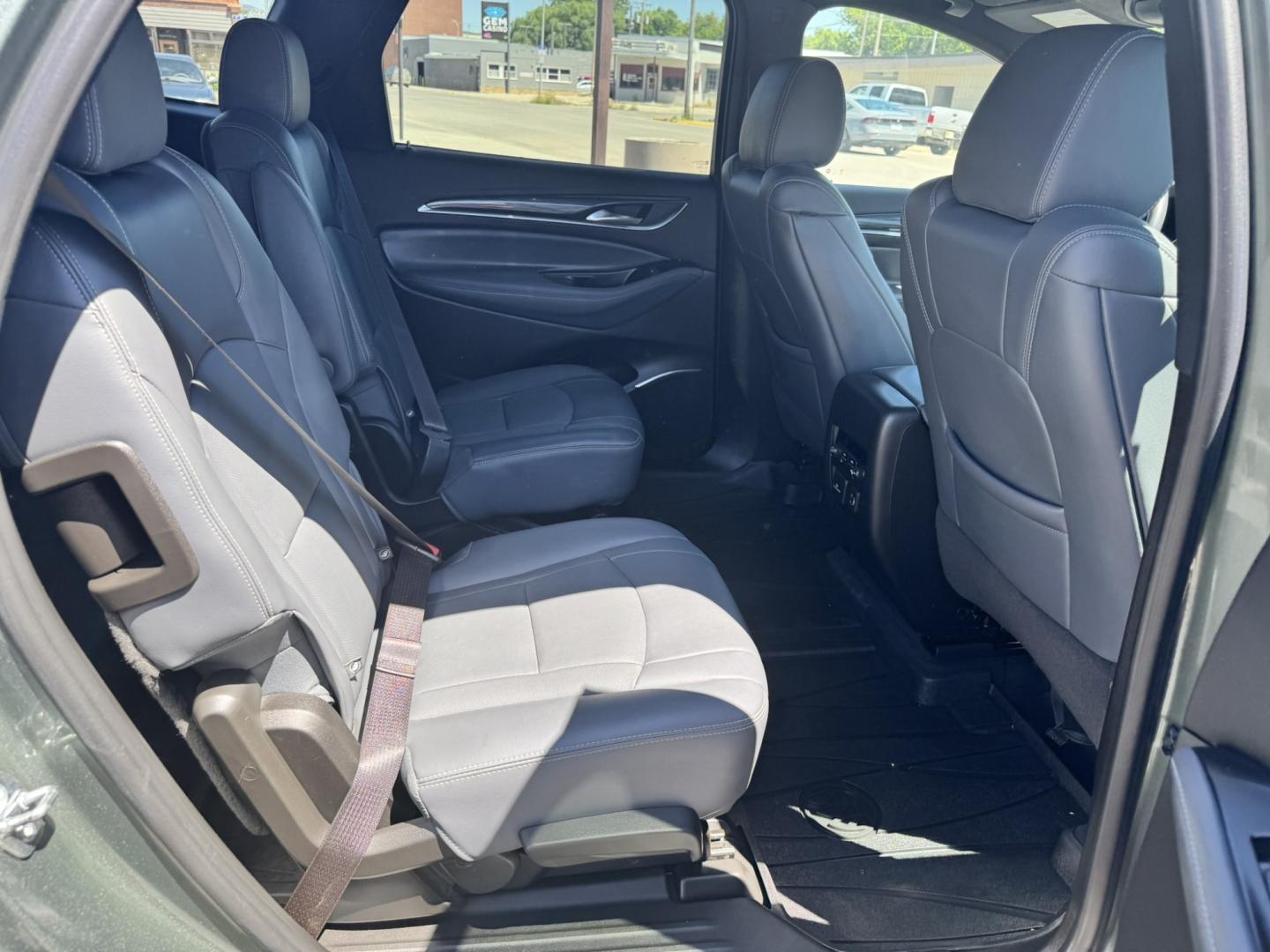 2022 Green /Grey Buick Enclave Premium AWD (5GAEVBKW6NJ) with an 3.6L V6 DOHC 24V engine, 9A transmission, located at 116 5th Avenue South, Lewistown, MT, 59457, 47.063877, -109.427879 - This 2022 Buick Enclave Premium AWD is the perfect mix of comfort, space, and confidence. Smooth-riding all-wheel drive makes it ideal year-round, while the Premium trim delivers the upscale feel Buick is known for. Leather seating, heated front seats, a power panoramic sunroof, and a quiet, refined- Photo#8