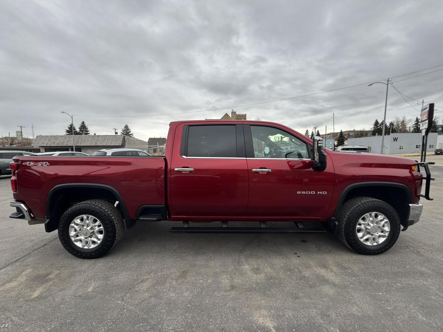 2021 Maroon /Grey Chevrolet Silverado 2500HD LTZ Crew Cab Standard Box 4WD (1GC4YPEY8MF) with an 6.6L V8 OHV 16V DIESEL engine, 6A transmission, located at 116 5th Avenue South, Lewistown, MT, 59457, 47.063877, -109.427879 - This 2021 Chevrolet Silverado 2500HD Crew Cab LTZ delivers heavy-duty capability with premium comfort. Powered by the proven Duramax diesel, it offers massive towing power and smooth, confident performance whether you’re working or traveling. The LTZ trim brings a well-appointed leather interior, - Photo#1