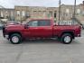 2021 Maroon /Grey Chevrolet Silverado 2500HD LTZ Crew Cab Standard Box 4WD (1GC4YPEY8MF) with an 6.6L V8 OHV 16V DIESEL engine, 6A transmission, located at 116 5th Avenue South, Lewistown, MT, 59457, 47.063877, -109.427879 - This 2021 Chevrolet Silverado 2500HD Crew Cab LTZ delivers heavy-duty capability with premium comfort. Powered by the proven Duramax diesel, it offers massive towing power and smooth, confident performance whether you’re working or traveling. The LTZ trim brings a well-appointed leather interior, - Photo#5