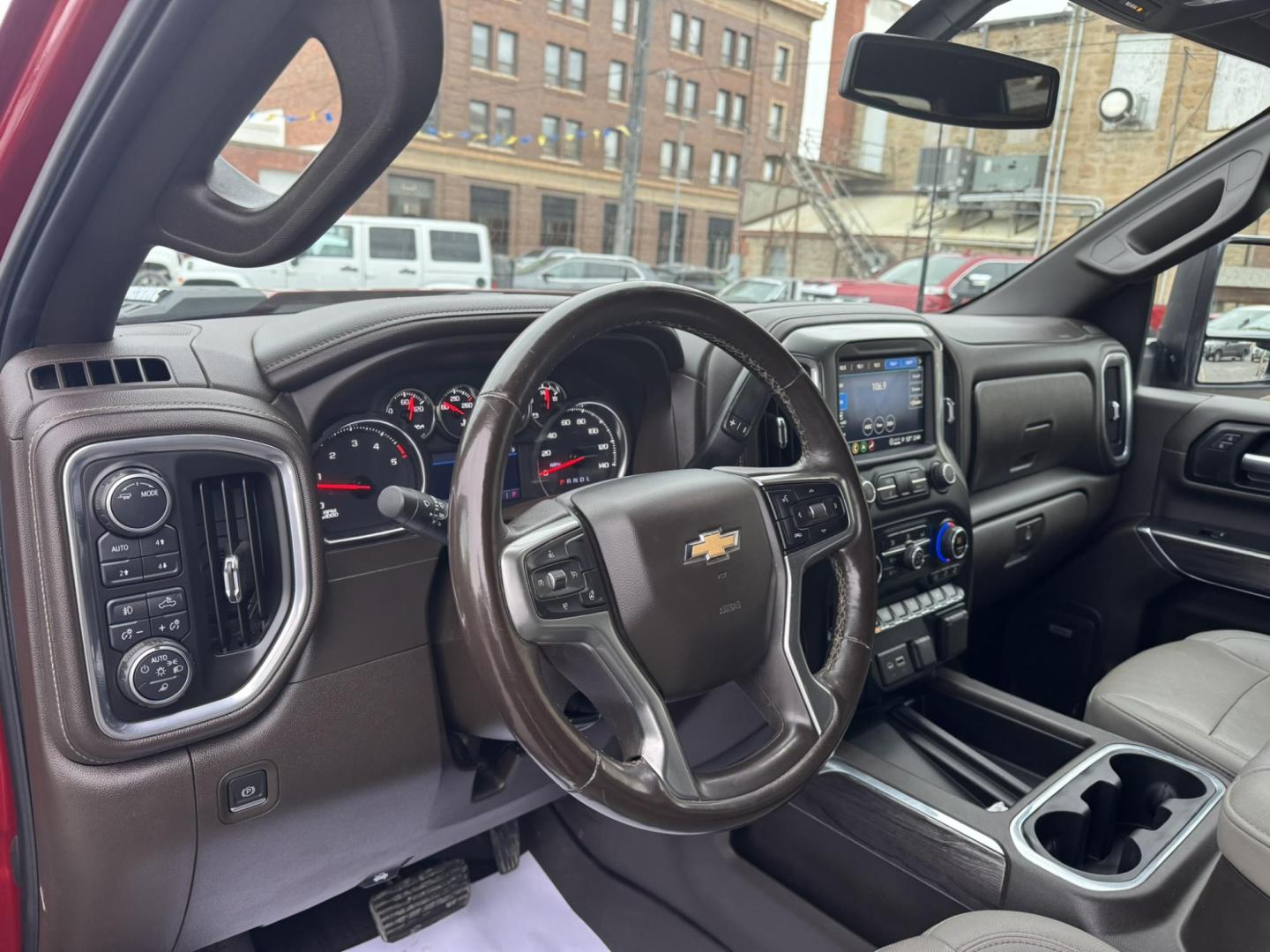 2021 Maroon /Grey Chevrolet Silverado 2500HD LTZ Crew Cab Standard Box 4WD (1GC4YPEY8MF) with an 6.6L V8 OHV 16V DIESEL engine, 6A transmission, located at 116 5th Avenue South, Lewistown, MT, 59457, 47.063877, -109.427879 - This 2021 Chevrolet Silverado 2500HD Crew Cab LTZ delivers heavy-duty capability with premium comfort. Powered by the proven Duramax diesel, it offers massive towing power and smooth, confident performance whether you’re working or traveling. The LTZ trim brings a well-appointed leather interior, - Photo#16