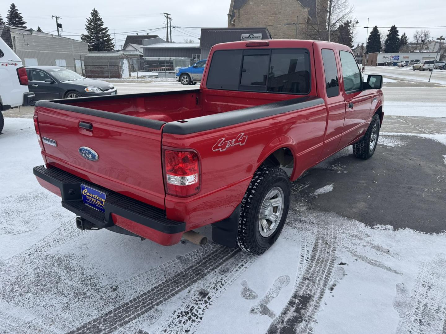 2009 Red /Grey Ford Ranger FX4 Off-Road SuperCab 4 Door (1FTZR45E19P) with an 4.0L V6 SOHC 12V engine, Automatic transmission, located at 116 5th Avenue South, Lewistown, MT, 59457, 47.063877, -109.427879 - Local trade, super clean Ranger 4X4 - Photo#2